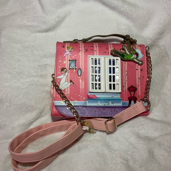 Disney Handbags - Disney Pink Peter Pan Story Window Crossbody with Gold Chain
